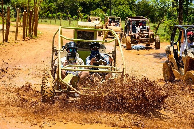Buggy Tour around Macao Beach and Taino Cave with Transportation - Riding the buggies through mud and country roads