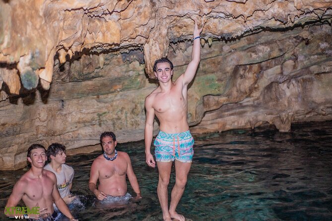 Buggy Tour Punta Cana A Cenote Secreto, Playa macao - Entering the cave and swimming in clear groundwater