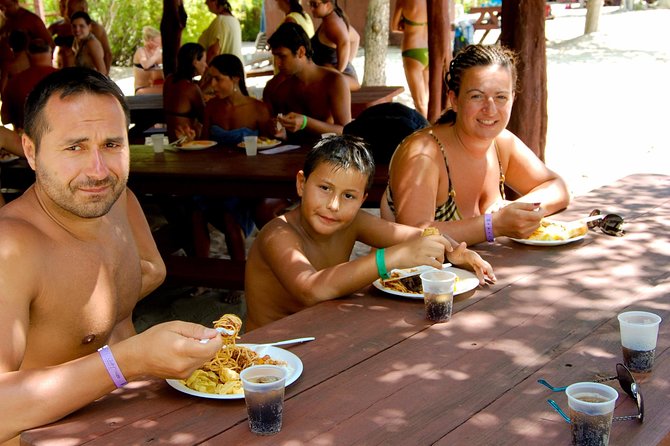 Catalina Island & Snorkeling Tour - Boarding the multihull at La Romana