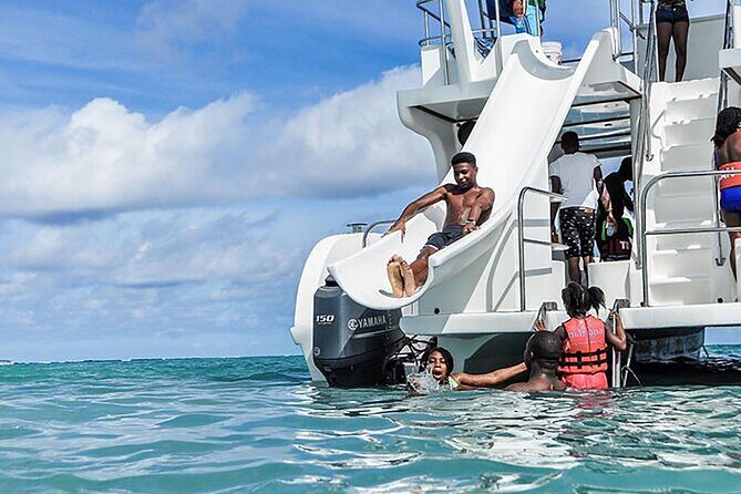 Catamaran Party in Punta Cana Includes Drink and Transportation - Punta de los Nidos and the water slide