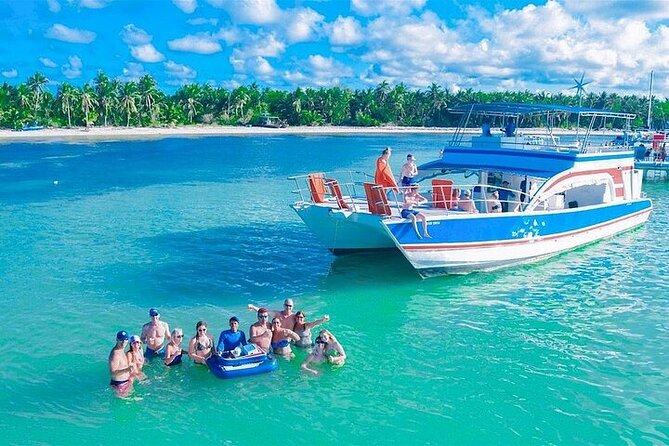 Catamaran Party in Punta Cana with Unlimited Drinks - The dolphin stop is for photos from a distance