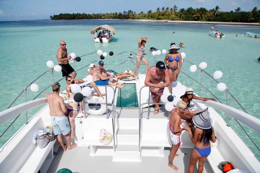 From Bavaro, Punta Cana: Boat Party, Snorkeling, Drinks, Snacks, and Transportation - First Stop: Looking for Dolphins for 25 Minutes