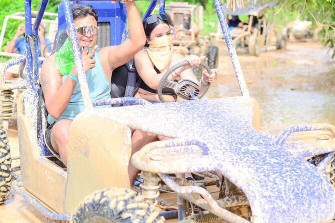Full-day Buggy & Party Boat tour: snorkel, open bar, cave pool - Moving from dust to the catamaran