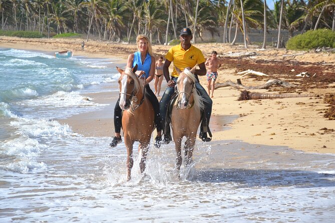Horseback Riding Adventure Punta Cana - Getting fitted with a horse and helmet