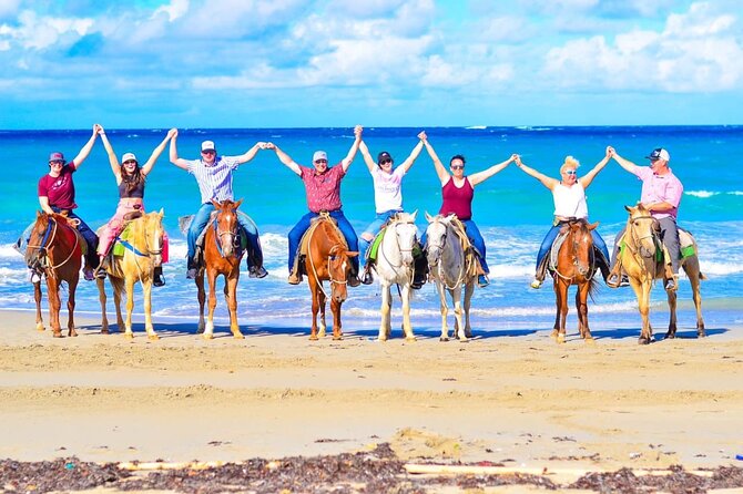 Horseback Riding Excursion to Macao Beach in Punta Cana - Riding through homes, ranches, and red soil fields
