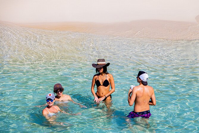 Private Catamaran + Private Parasailing - up to 20 passengers - More than parasailing: swimming, snorkeling, and boat time