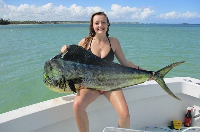 Private Fishing Charter in Punta Cana (Emmanuel) - Drinks, sandwiches, and tropical fruit