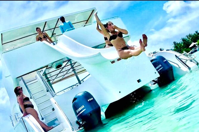 Punta Cana Booze Cruise, Snorkeling, Bar Entertainment Open Bar - The floating pad and onboard water slide