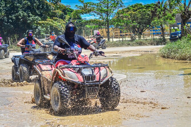 Punta Cana Buggy and ATV Adventure Tour - Swimming in the clear-water cave at Domitai Park
