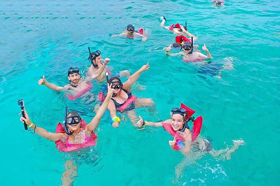 Punta Cana: Catamaran Boat Party with Unlimited Drinks - Snorkeling in Clear Coastal Water