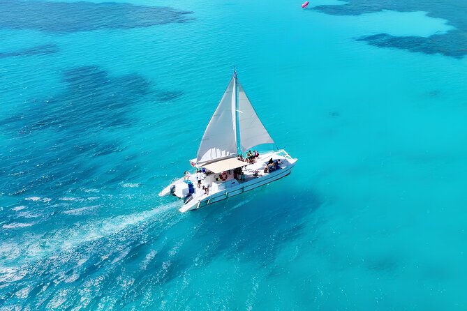 Punta Cana Catamaran Party– Snorkeling, Open Bar, Music & Pickup - Boarding the boat and finding your pace