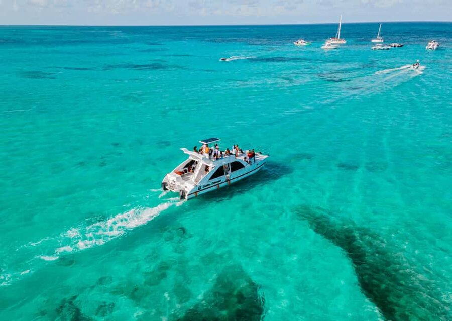 Punta Cana: Catamaran Tour with Reef Snorkeling and Open Bar - The Bavaro natural pool and shallow-water fun