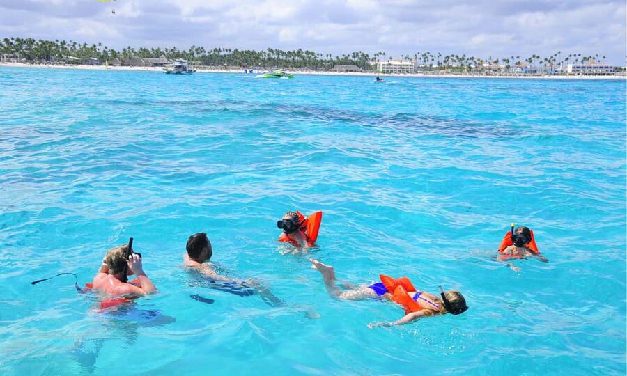 Punta Cana: Catamaran Tour with Reef Snorkeling and Open Bar - Pickup from Punta Cana and the ride to the dock