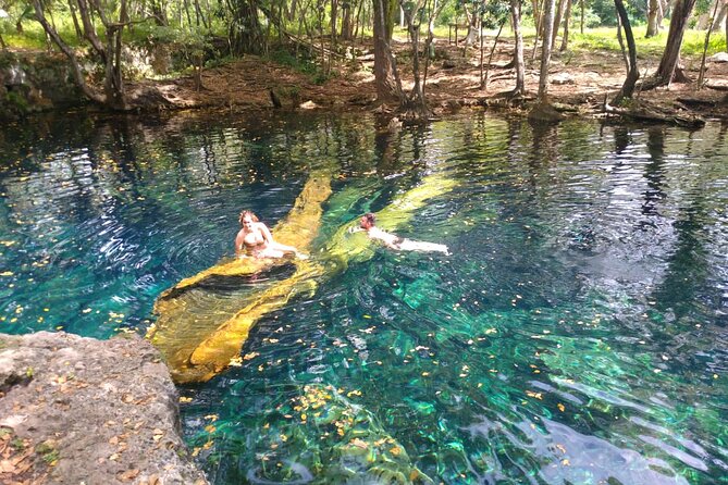 Punta Cana Cenote Hoyo Claro Hiking Tour + Juanillo Beach - Walking the narrow trail into Hoyo Claro