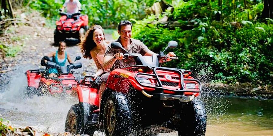 Punta Cana : Done Buggy Excursions AtV /cenote on the Beach - Driving through mud, plantations, and the riverbed
