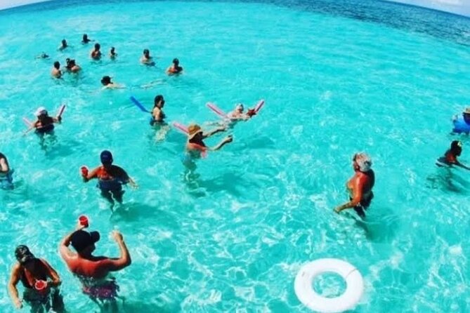 Punta Cana Party Booze Cruise, open bar, snorkeling Only Adult - The crew and the human side of the trip