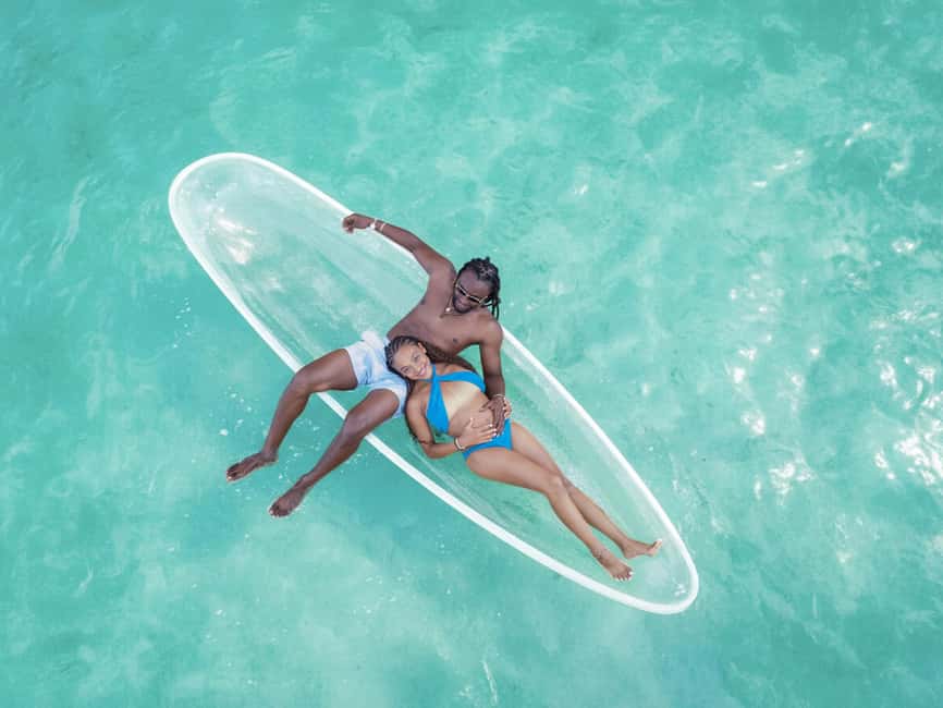 Punta Cana: Single Clear Kayak Photoshoot - Getting into the clear kayak with help