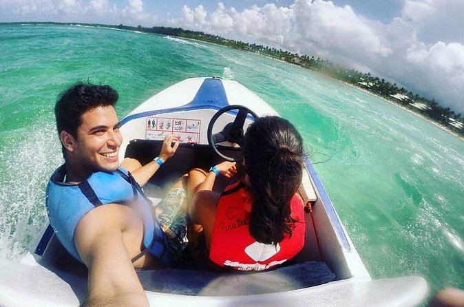 Punta Cana Speed Boat with Snorkelling - Driving a speedboat off Bavaro Beach