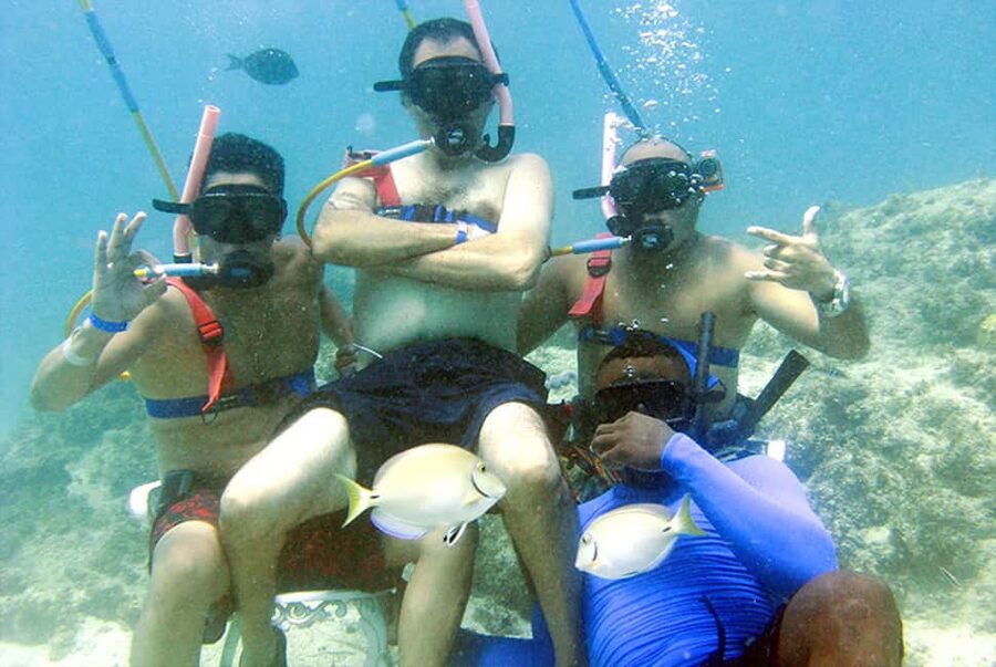 Sailing Splash Tour Speedboat, Snorkel, and Catamaran - Snorkeling over Punta Cana’s colorful reef