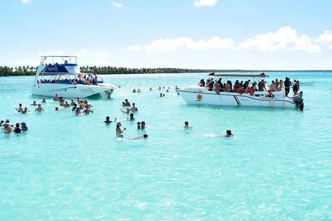 Saona Island Tour From Santo Domingo with Lunch, Open Bar, Pickup - The catamaran return, with music and a party mood