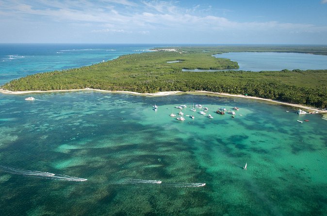 Small Group Punta Cana Snorkeling with Premium Open Bar - The slide, paddle boards, and sandbar stop