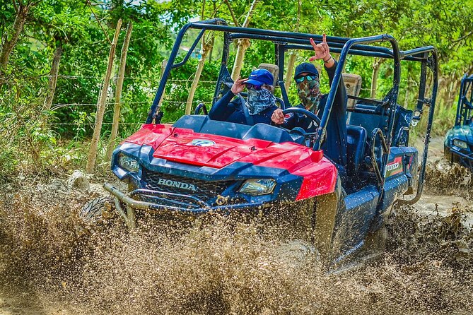 Vip Punta cana Buggies - Macao Beach, clear water, and a busy shore